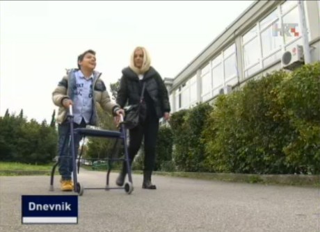 Luka Wagner gets to school  helped by his mum Photo: Screenshot TV hrt.hr 3 November 2014