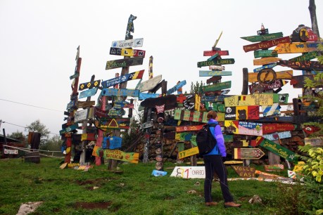 Signposts left by visitors at Kuterevo Bear Rescue