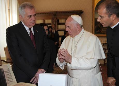 Pope Francis speaks with Serbian President Tomislav Nikolic, during a private audience at the Vatican, Friday, Sept. 11, 2015. (Claudio Onorati/Pool photo via AP)
