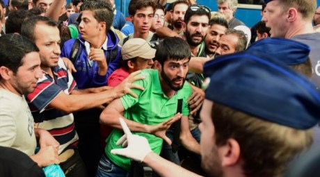 At Macedonian border with Greece 10 March 2016 Scuffles and violence as refugees and migrants try to push across borders AFP Photo 