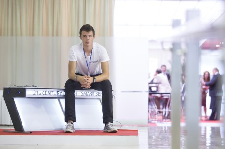 Croatia's innovator Ivan Mrvos sitting on his Smart Bench