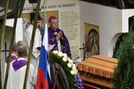 Bishop Lipovsek blessing the caskets with victims' remains Monday 3 October 2016 Huda Pit Slovenia Photo: STA